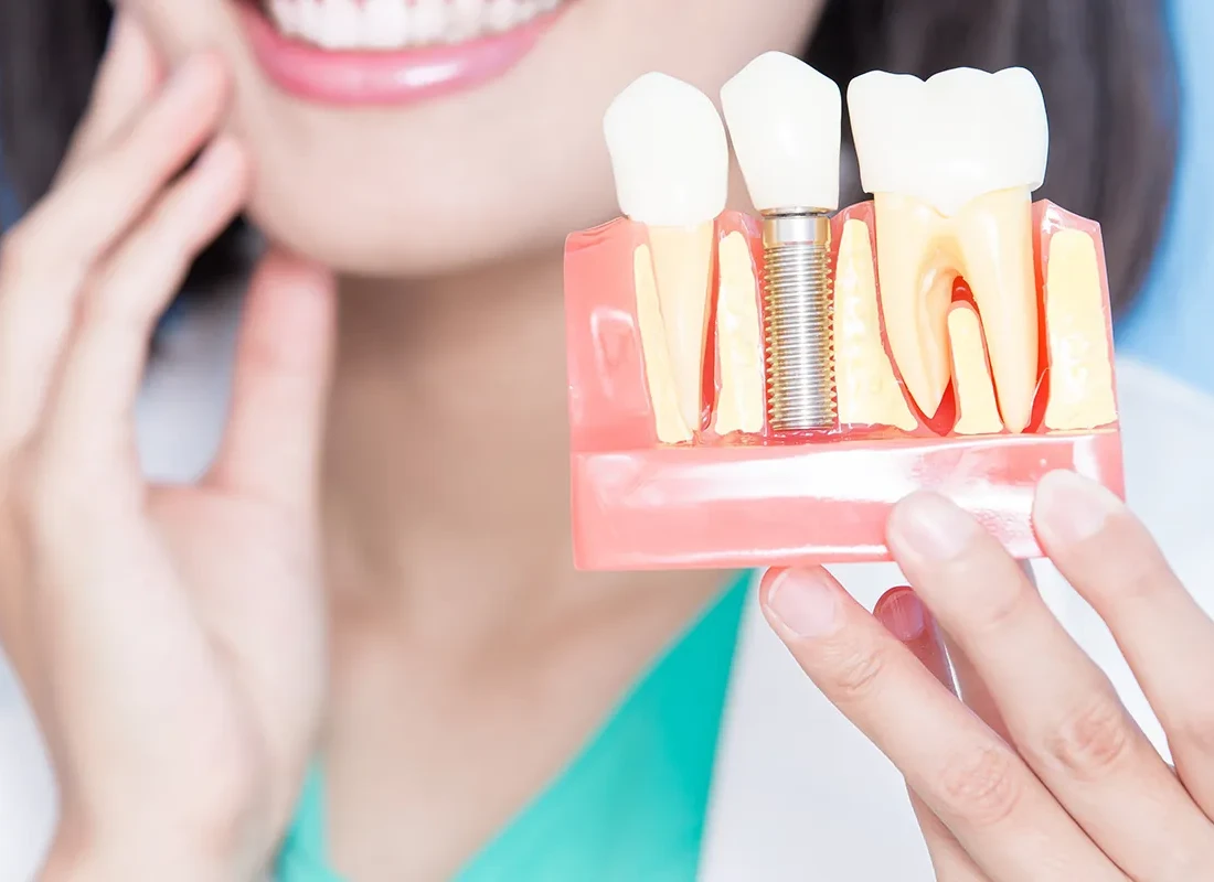 Reviewing dental implant options at Valencia Aesthetic Dentistry